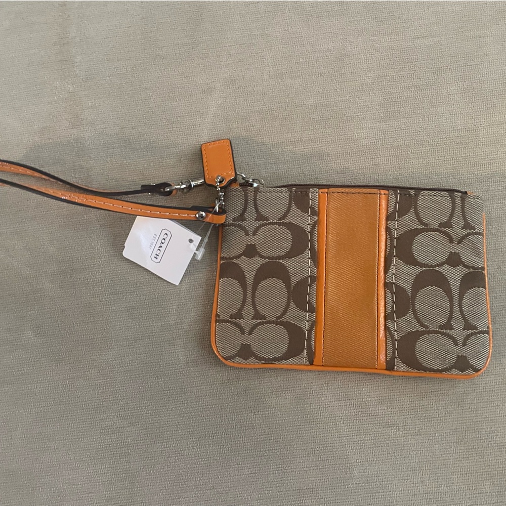 Coach wristlet new with tags. Gorgeous